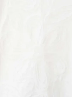T-shirt en coton blanc uni avec une coupe droite et un col rond