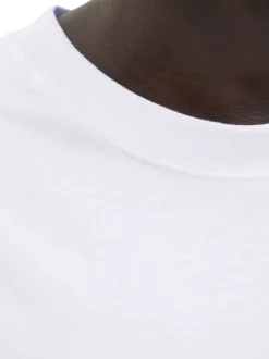 T-shirt en coton blanc uni avec une coupe droite et un col rond