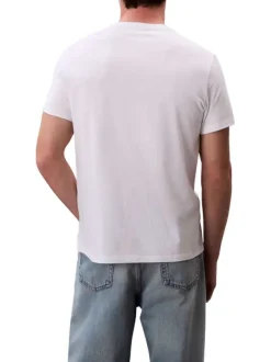 T-shirt en coton blanc uni avec un petit patch brodé et à col rond