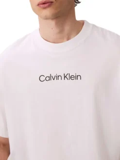 T-shirt en coton blanc uni coupe ajustée col rond avec un logo blanc