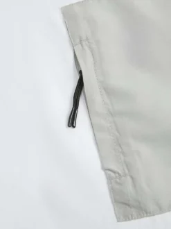 T-shirt en coton blanc uni à coupe droite et à col rond avec une poche zippée