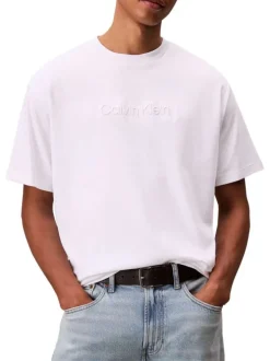 T-shirt en coton blanc uni à coupe oversize avec le nom de la marque brodé
