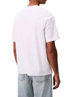 T-shirt en coton blanc uni à coupe oversize avec le nom de la marque brodé