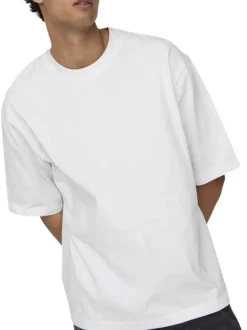 T-shirt en coton blanc uni épais avec une coupe très oversize et un col rond