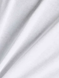 T-shirt en coton blanc uni pourvu d'un col rond et de manches courtes