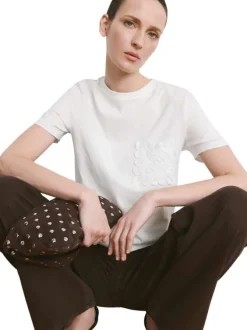 T-shirt en coton blanc uni pourvu d'un col rond et d'une coupe droite