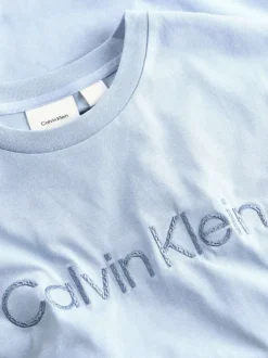 T-shirt en coton bleu ciel uni à coupe droite avec le nom de la marque imprimé