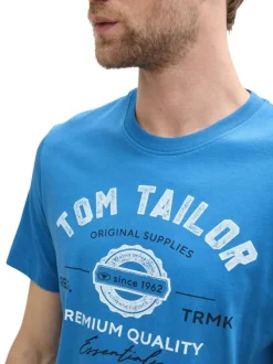 T-shirt en coton bleu à col rond avec un gros imprimé à l'avant