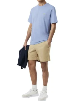 T-shirt en coton bleu à coupe droite pourvu d'un col rond côtelé
