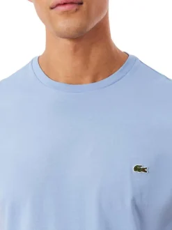 T-shirt en coton bleu à coupe droite pourvu d'un col rond côtelé