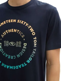 T-shirt en coton bleu marine à col rond avec un gros imprimé coloré à l'avant