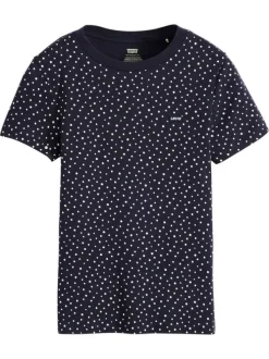 T-shirt en coton bleu marine à pois avec une coupe près du corps et un col rond