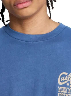 T-shirt en coton bleu marine uni avec une coupe droite et un col rond