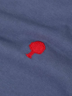 T-shirt en coton bleu marine uni avec une coupe droite et un col rond