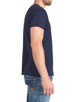 T-shirt en coton bleu marine uni à col rond avec une petite poche à la poitrine