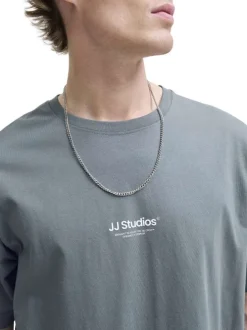 T-shirt en coton bleu uni avec une coupe droite et un col rond