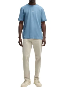 T-shirt en coton bleu uni à col rond avec le nom de la marque imprimé en petit