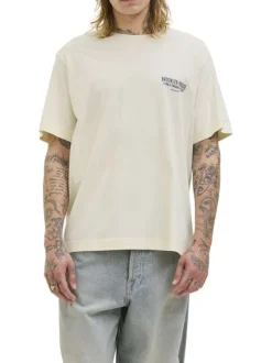 T-shirt en coton écru avec un imprimé une coupe droite et un col rond