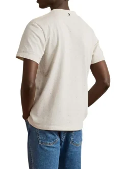 T-shirt en coton écru effet moucheté avec une coupe droite et un col rond
