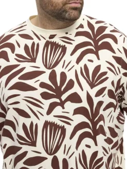 T-shirt en coton écru à imprimé feuilles bordeaux et à col rond