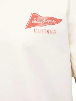 T-shirt en coton écru uni avec une coupe droite et un col rond