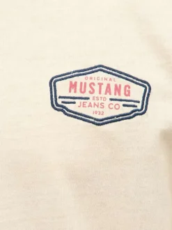 T-shirt en coton écru uni avec une coupe droite et un col rond