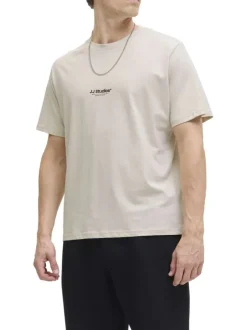 T-shirt en coton écru uni avec une coupe droite et un col rond