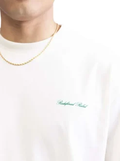 T-shirt en coton écru uni avec une coupe droite et un col rond