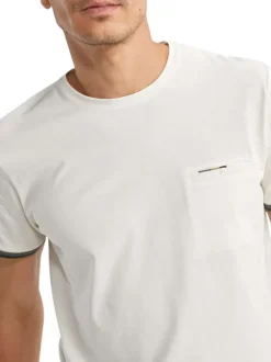 T-shirt en coton ecru uni pourvu de manches courtes et d'un col rond