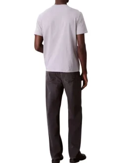 T-shirt en coton gris clair uni avec un petit patch brodé et à col rond