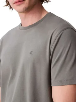 T-shirt en coton gris uni à col rond avec le mini logo brodé à la poitrine