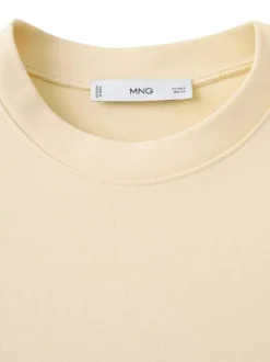 T-shirt en coton jaune pâle uni avec une coupe droite et un col rond