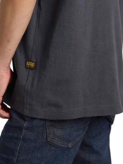 T-shirt en coton marine imprimé avec une coupe droite à col rond