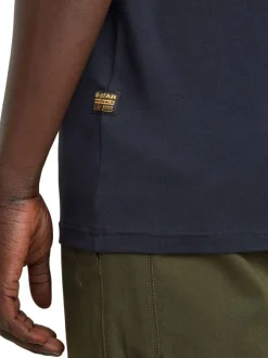 T-shirt en coton marine uni avec une coupe droite et nom iconique