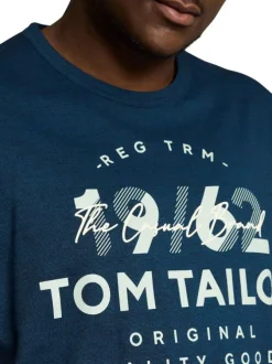 T-shirt en coton marine uni pourvu d'un col rond et de manches courtes