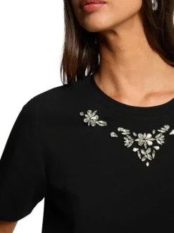 T-shirt en coton noir à coupe droite pourvu d'un col rond et de manches courtes