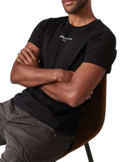 T-shirt en coton noir imprimé au dos à col rond et à coupe droite