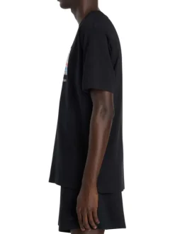 T-shirt en coton noir à imprimé avec une coupe droite et un col rond