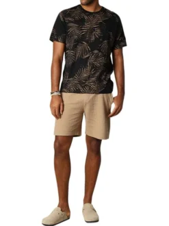 T-shirt en coton noir imprimé avec une coupe droite et un col rond