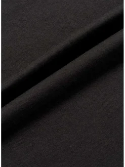 T-shirt en coton noir imprimé crâne avec une coupe droite et un col rond
