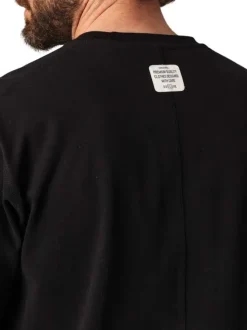 T-shirt en coton noir uni avec un col rond et des manches courtes