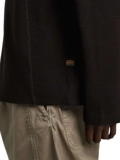 T-shirt en coton noir uni avec un col rond et une coupe droite