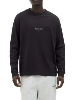 T-shirt en coton noir uni avec un col rond et une coupe droite