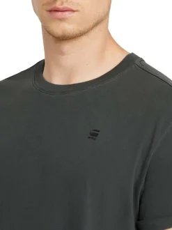T-shirt en coton noir uni avec un col rond et une coupe droite