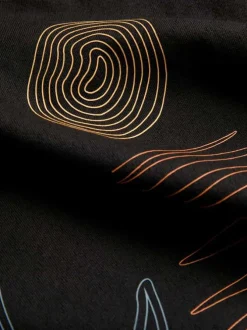 T-shirt en coton noir uni avec un col rond et une coupe droite