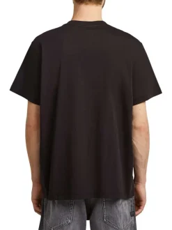 T-shirt en coton noir uni avec un col rond et un patch d'authenticité