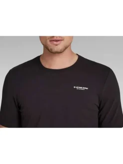 T-shirt en coton noir uni avec une col rond et une coupe droite