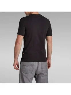 T-shirt en coton noir uni avec une col rond et une coupe droite