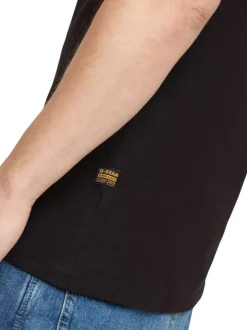 T-shirt en coton noir uni avec une col rond et une coupe droite