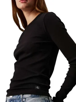 T-shirt en coton noir uni avec une coupe droite à col rond et logo iconique